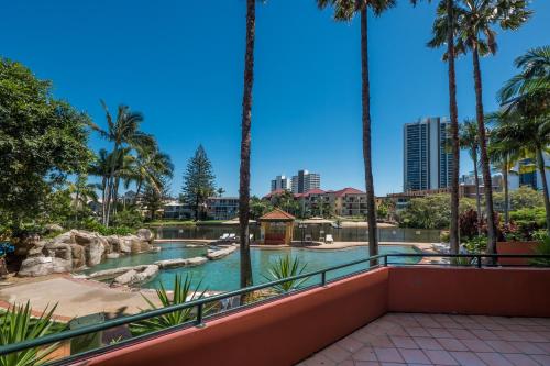 a view of the pool from the balcony of a resort at Paradise Island Resort in Gold Coast