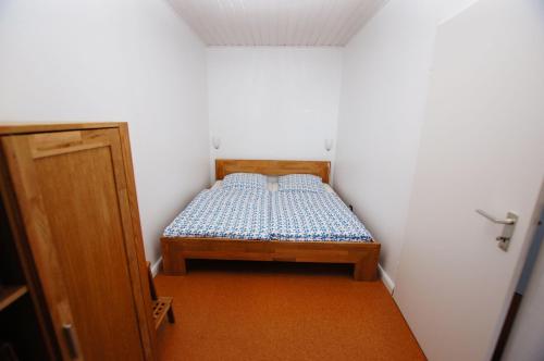 フェーマルンにあるStrabarの小さなベッドルーム(ベッド1台付)