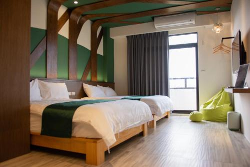 Postel nebo postele na pokoji v ubytování Traveler's Campfire B&B