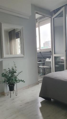 Katil atau katil-katil dalam bilik di Warszawa Centrum Apartament Daniella