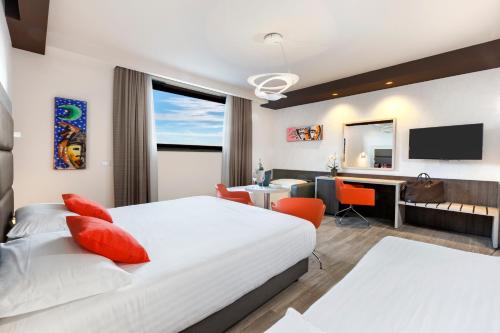 Cama o camas de una habitación en Bhotel