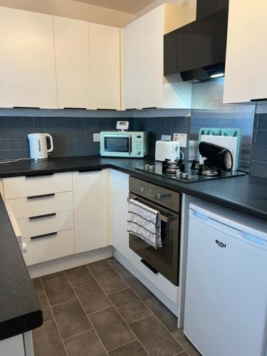 Köök või kööginurk majutusasutuses Stylish 2bed house in birmingham