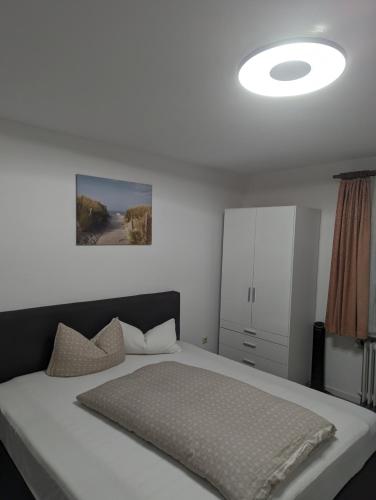 Ένα ή περισσότερα κρεβάτια σε δωμάτιο στο Hotel Heideklause