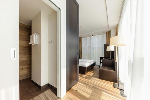 Postel nebo postele na pokoji v ubytování Hotel kommod