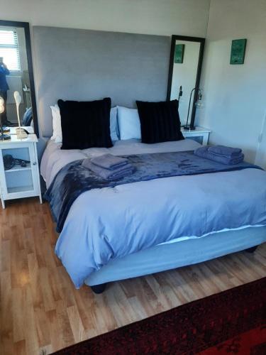 Ένα ή περισσότερα κρεβάτια σε δωμάτιο στο Croeso Guest House