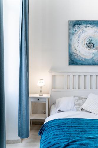 Ένα ή περισσότερα κρεβάτια σε δωμάτιο στο Mlynska Center Apartment Kosice with private Parking