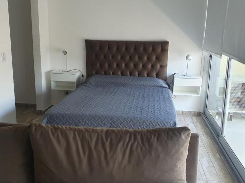 Una cama o camas en una habitación de Hermoso Departamento en Palermo Hollywood y cerca de Movistar Arena