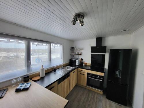 Kuchyň nebo kuchyňský kout v ubytování appartement proche des remparts