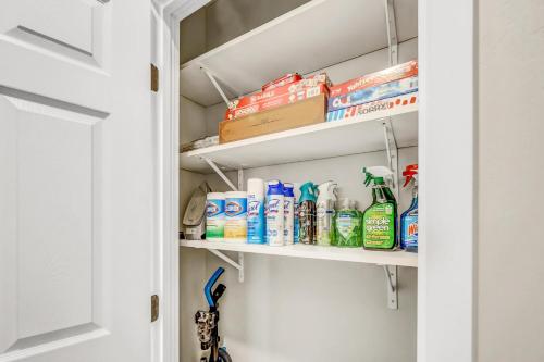 a pantry with cleaning products on shelves at Two Bedroom-Queen in Master. Heart of Downtown Vista in Vista