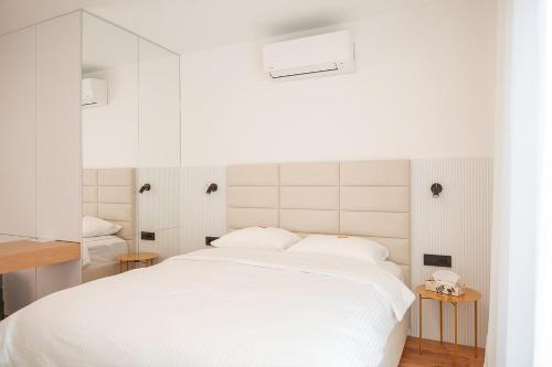 Postelja oz. postelje v sobi nastanitve 26 Bricks Suites