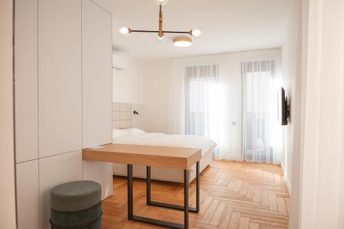 Krevet ili kreveti u jedinici u okviru objekta 26 Bricks Suites
