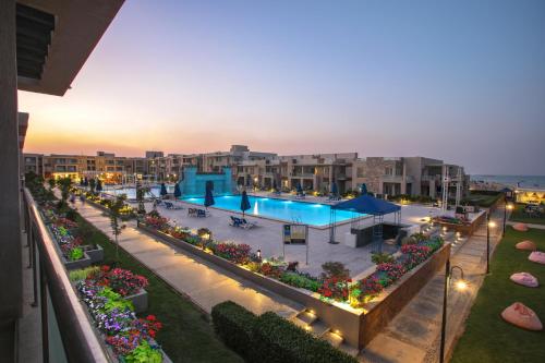 an aerial view of a resort with a swimming pool at Elite Residence Aqua Park in Ain Sokhna