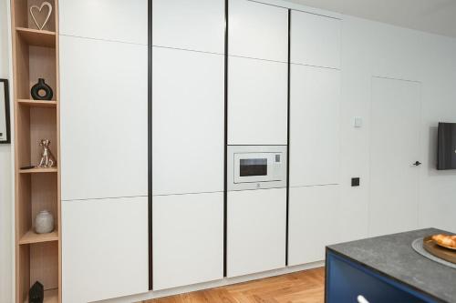 Kitchen o kitchenette sa 26 Bricks Suites