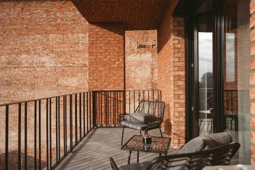 26 Bricks Suites tesisinde bir balkon veya teras