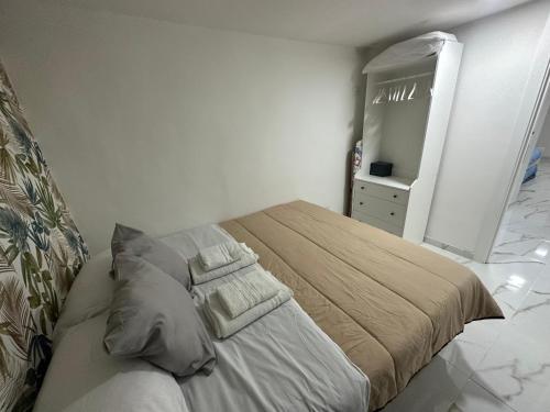Tempat tidur dalam kamar di San Matteo House