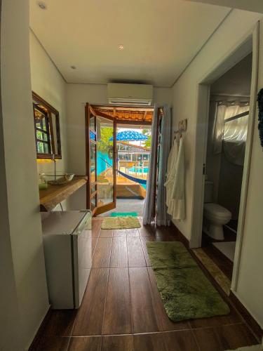 Φωτογραφία από το άλμπουμ του Pousada Orquídeas do Guarujá σε Γκουαρούχα