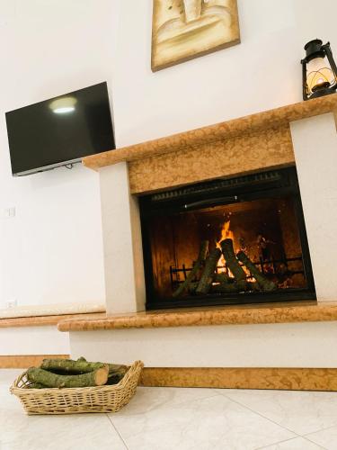 TV a/nebo společenská místnost v ubytování B&B Villa Maggi