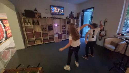 TV a/nebo společenská místnost v ubytování ArtRock Residence