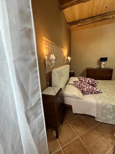 Katil atau katil-katil dalam bilik di B&B Casa CamiLory