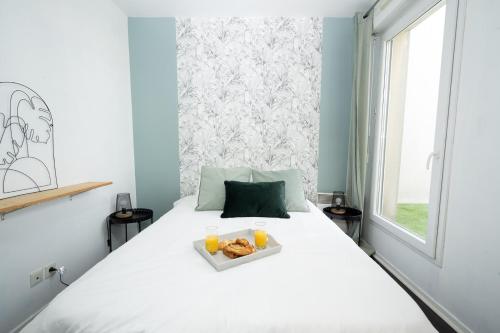 Zdjęcie z galerii obiektu T3-RARE-2 chambres-PARKING gratuit-2 TERRASSES-Netflix-proche PARIS-La Défense w mieście Argenteuil
