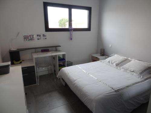 Posteľ alebo postele v izbe v ubytovaní Villa moderne dans quartier calme