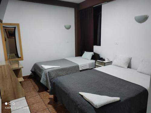 Katil atau katil-katil dalam bilik di Zentrico Hotel