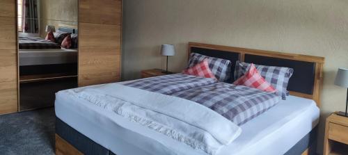 Postel nebo postele na pokoji v ubytování Lili's Appartements