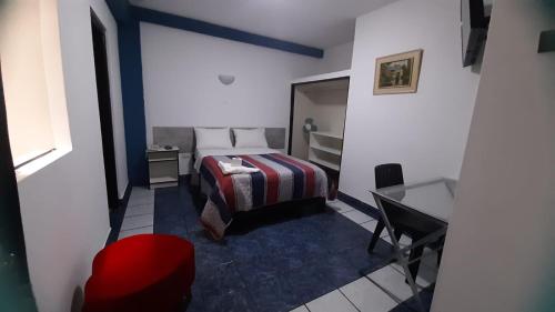 Katil atau katil-katil dalam bilik di Zentrico Hotel