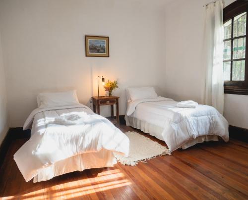 En eller flere senge i et værelse på Casa al pie de la Montaña