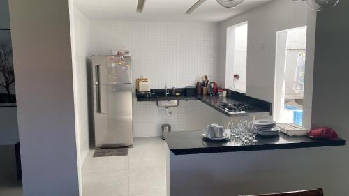 Dapur atau dapur kecil di Casa aconchegante com piscina e muito espaço verde