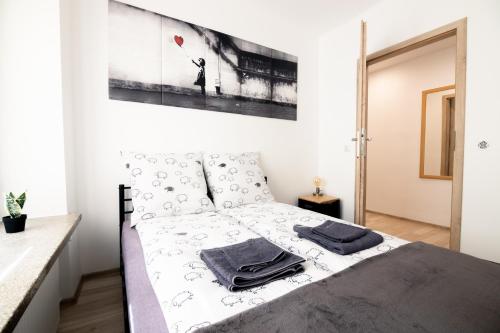 Posteľ alebo postele v izbe v ubytovaní THE SOUL of Nowa Huta - free garage