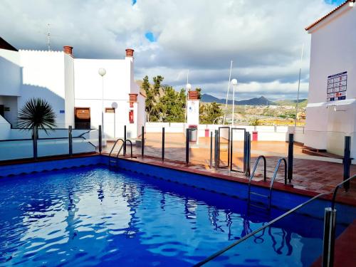 Swimmingpoolen hos eller tæt på Cozy Montanita Apartment