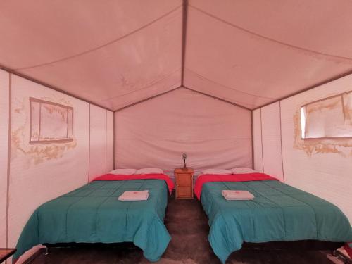 Voodi või voodid majutusasutuse Ecocamp Huacachina toas
