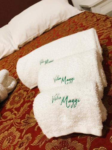 Postel nebo postele na pokoji v ubytování B&B Villa Maggi