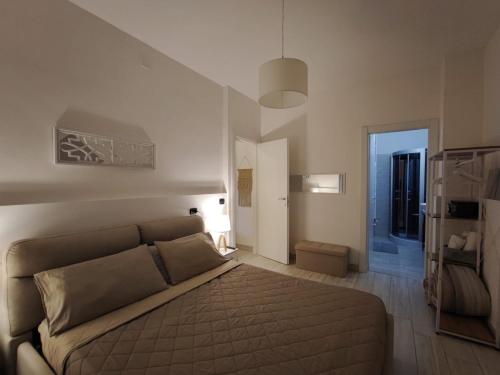 a bedroom with a large bed in a room at My Suite Fiuggi in Fiuggi
