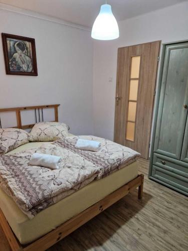 Postel nebo postele na pokoji v ubytování Apartament w Centrum