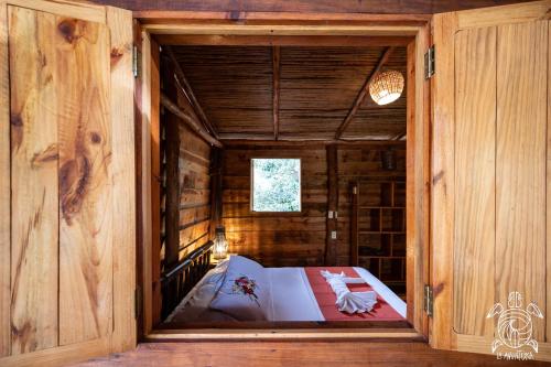 Ένα ή περισσότερα κρεβάτια σε δωμάτιο στο Casa La Aventura Guasacate - Popoyo