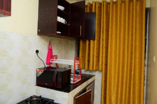 Kuchyň nebo kuchyňský kout v ubytování Elegant studio apartment