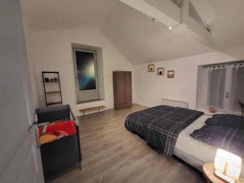 Postel nebo postele na pokoji v ubytování appartement proche des remparts