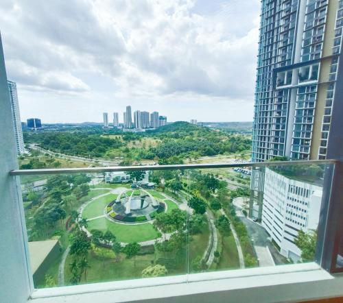 a view of a park from a window in a building at Medini Elysia Park , 3 min to Legoland, Netflix By Hint Homestay in Nusajaya