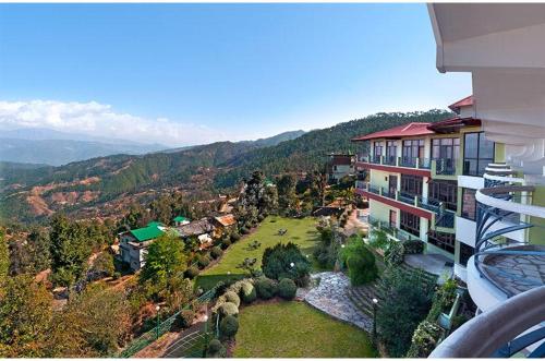 an aerial view of a house with a yard at Suman Royal in Kausani