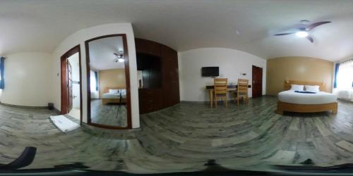 Кровать или кровати в номере Victoria Mews Hotel