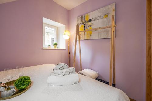 Posteľ alebo postele v izbe v ubytovaní Stone apartment in Center