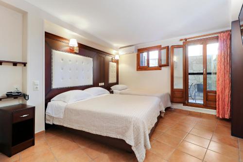Ένα ή περισσότερα κρεβάτια σε δωμάτιο στο Alsos House