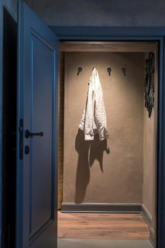 a shadow of a towel hanging on a wall at Rastrello in Panicale