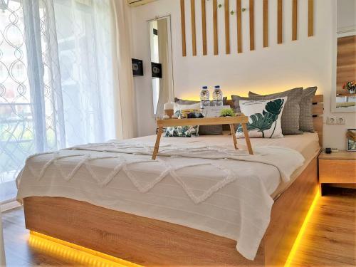 A bed or beds in a room at Little Treasure by the Sea