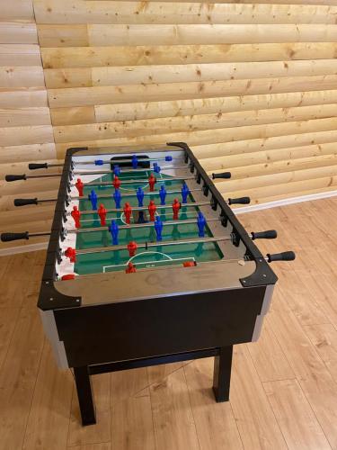 a pool table with a cake on top of it at Villa Sarajevo in Vareš