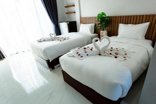 Postel nebo postele na pokoji v ubytování Korner Grand Hotel