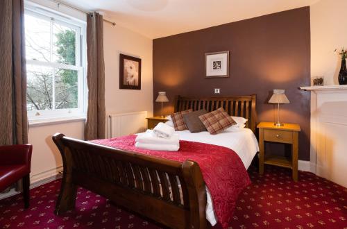 Postel nebo postele na pokoji v ubytování Killin Hotel