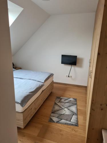 Postel nebo postele na pokoji v ubytování Stadtloft